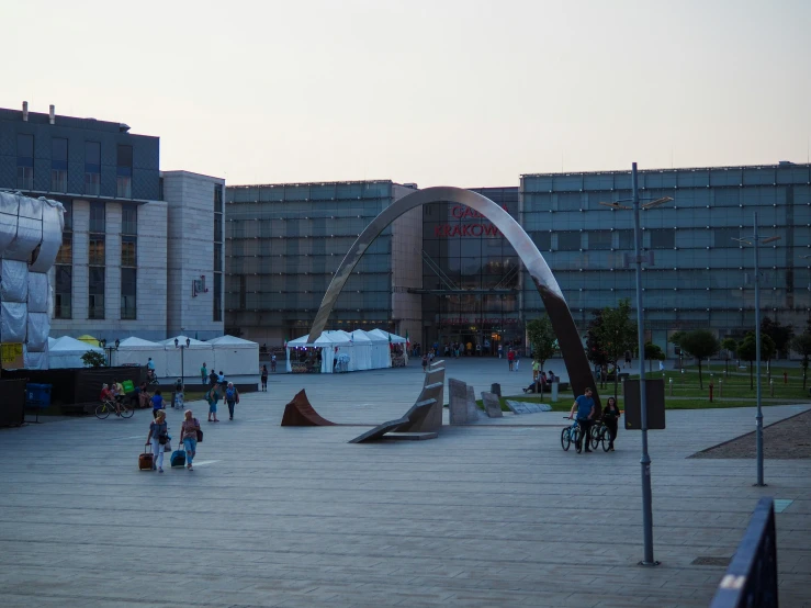 several skateboarders skate up and down ramps