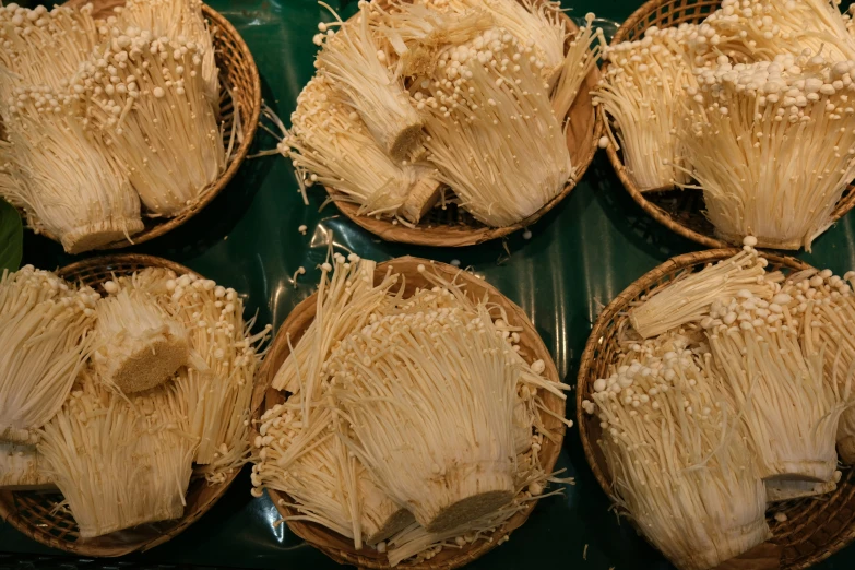 close up of baskets with flowers on them