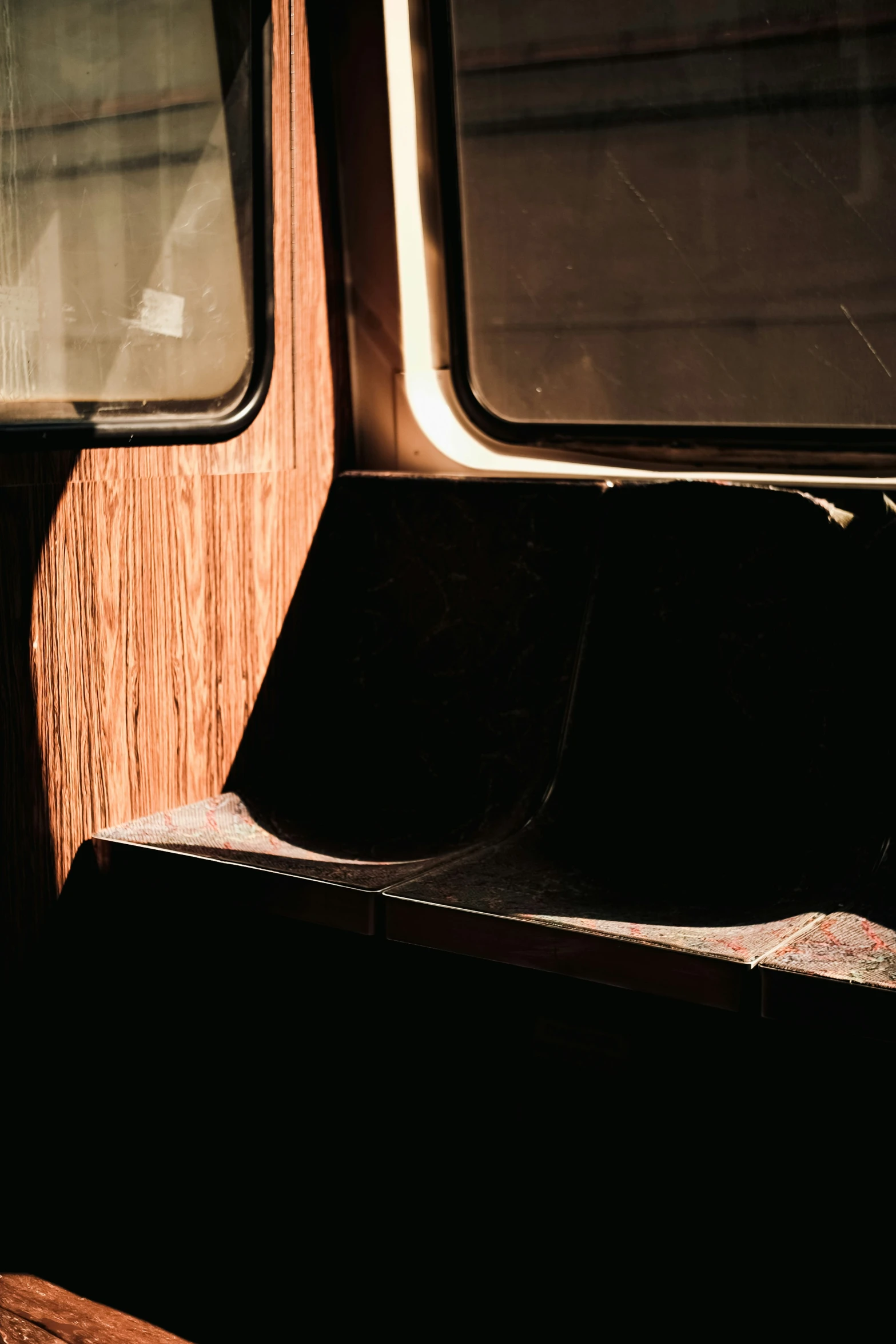 an empty seat is seen on the side of a train