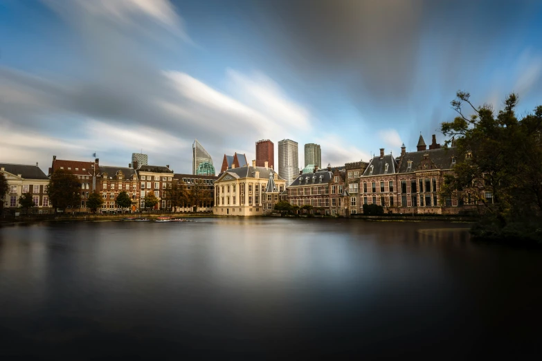 a view of an area surrounded by other buildings with large water and sky