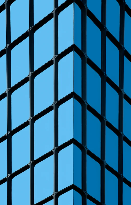 the outside of an office building with blue glass