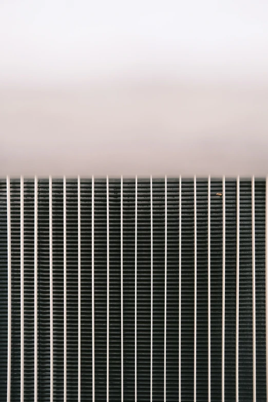 close up view of a metal radiator with horizontal bars on it