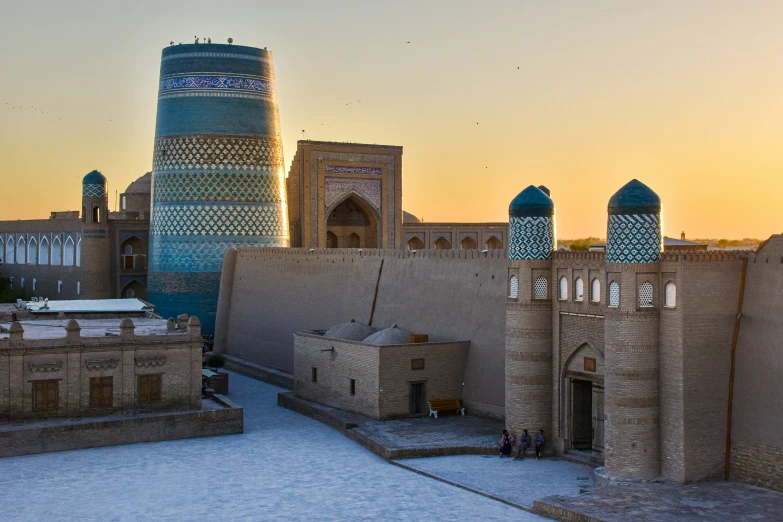 the buildings are made out of bricks and some blue tiles