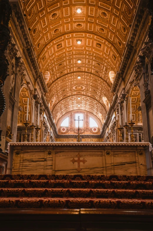 a very large building with a big wooden alter