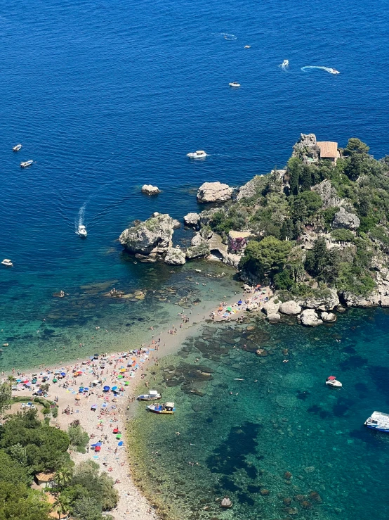 a group of people laying out in the ocean