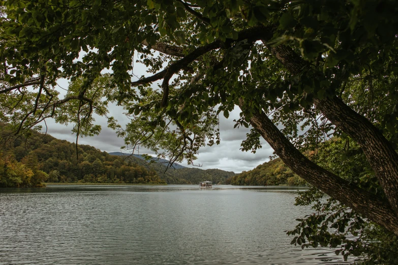 a view of a body of water with two boats