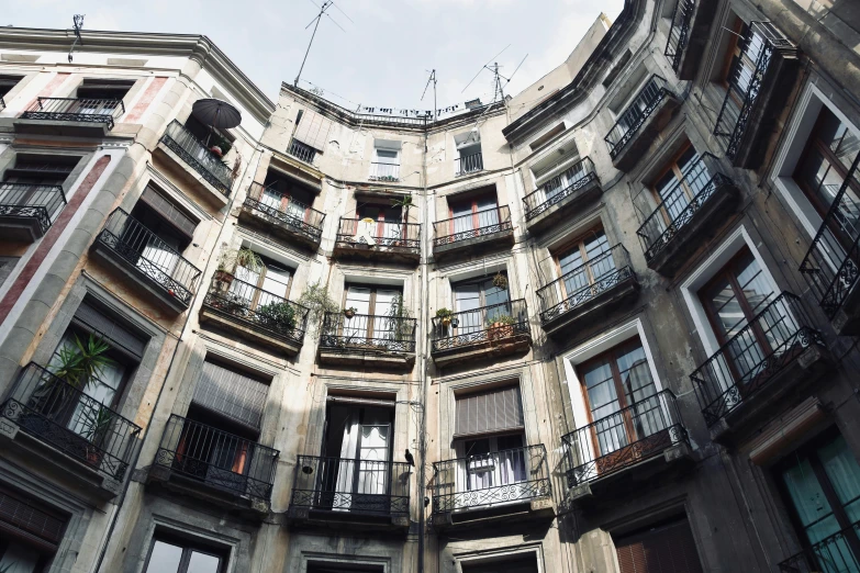 an image looking up from inside an apartment building