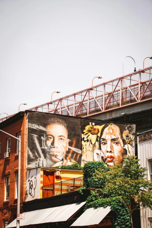 a wall with several different faces on it