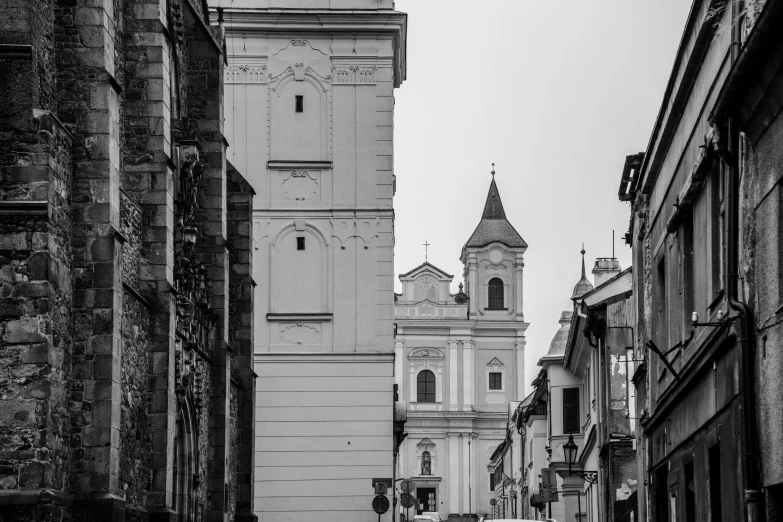 a cobblestone street in front of old buildings