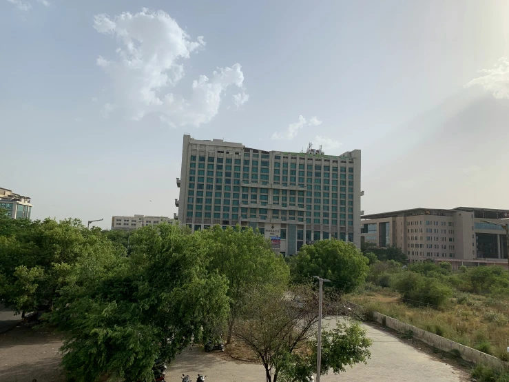 the large building is standing tall on top of the hillside