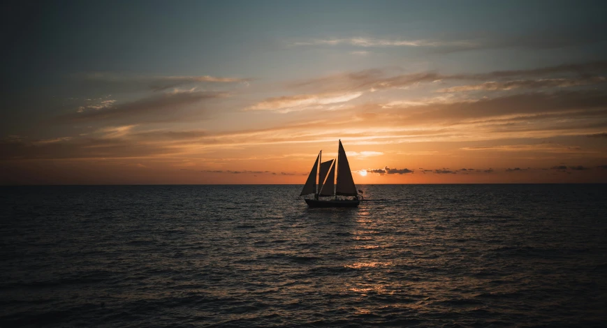 a boat traveling through a large body of water