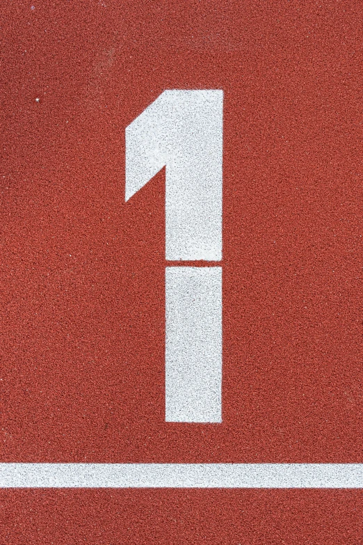 white numbers on red tennis court with line