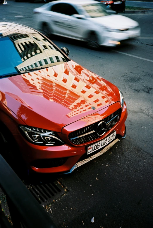 this red sports car has a black top