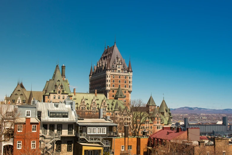 the old castle like building stands out in the skyline