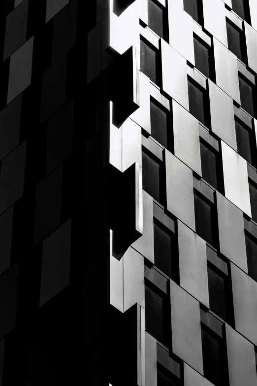 an abstract image of a building that is made up of black and white squares