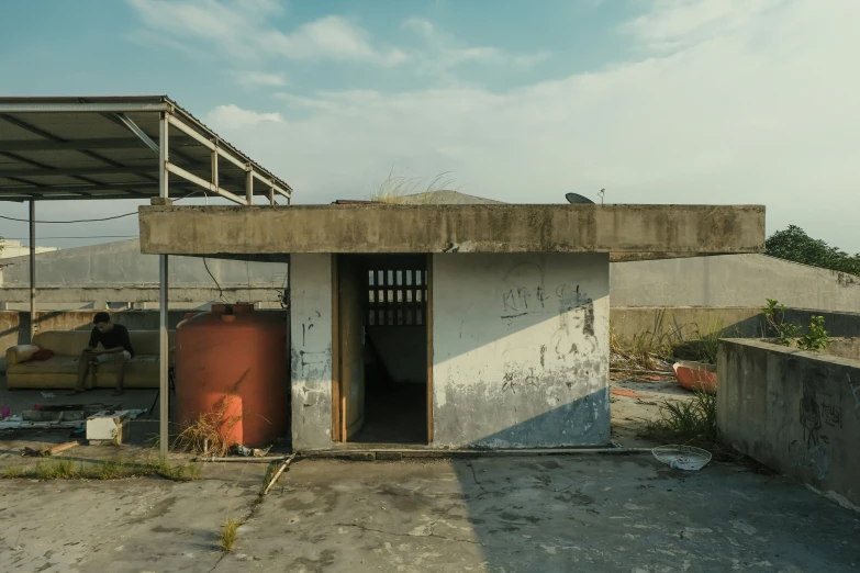 a building with doors on it and a roof