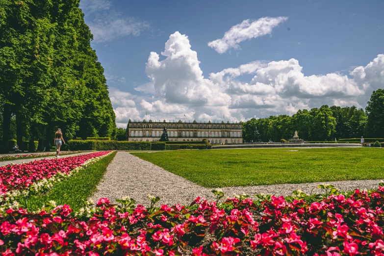 a building near a flower garden on the side