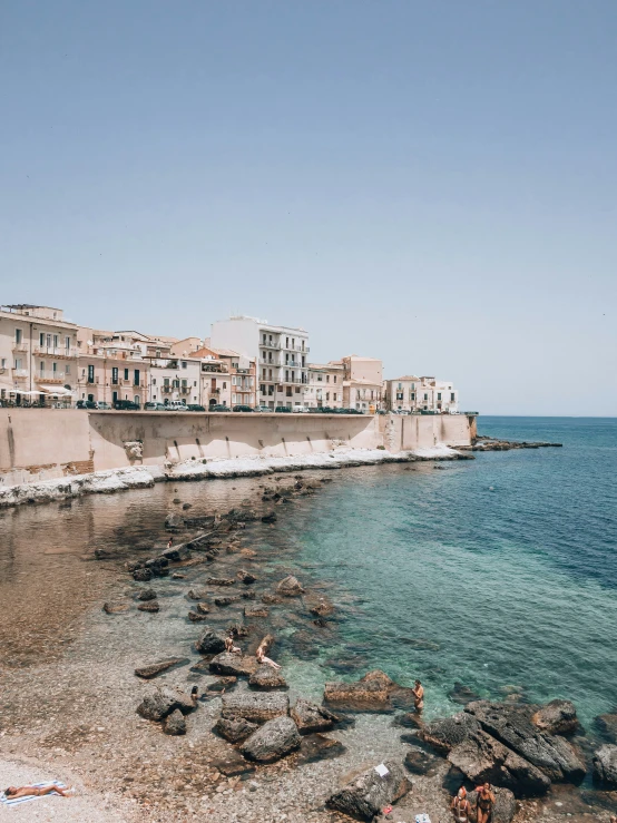 a beach view of buildings sitting on it's head