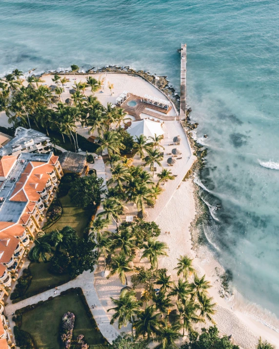 an aerial view of a home on the beach