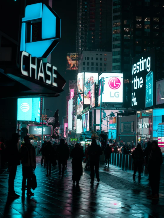 a group of people walk through a large area