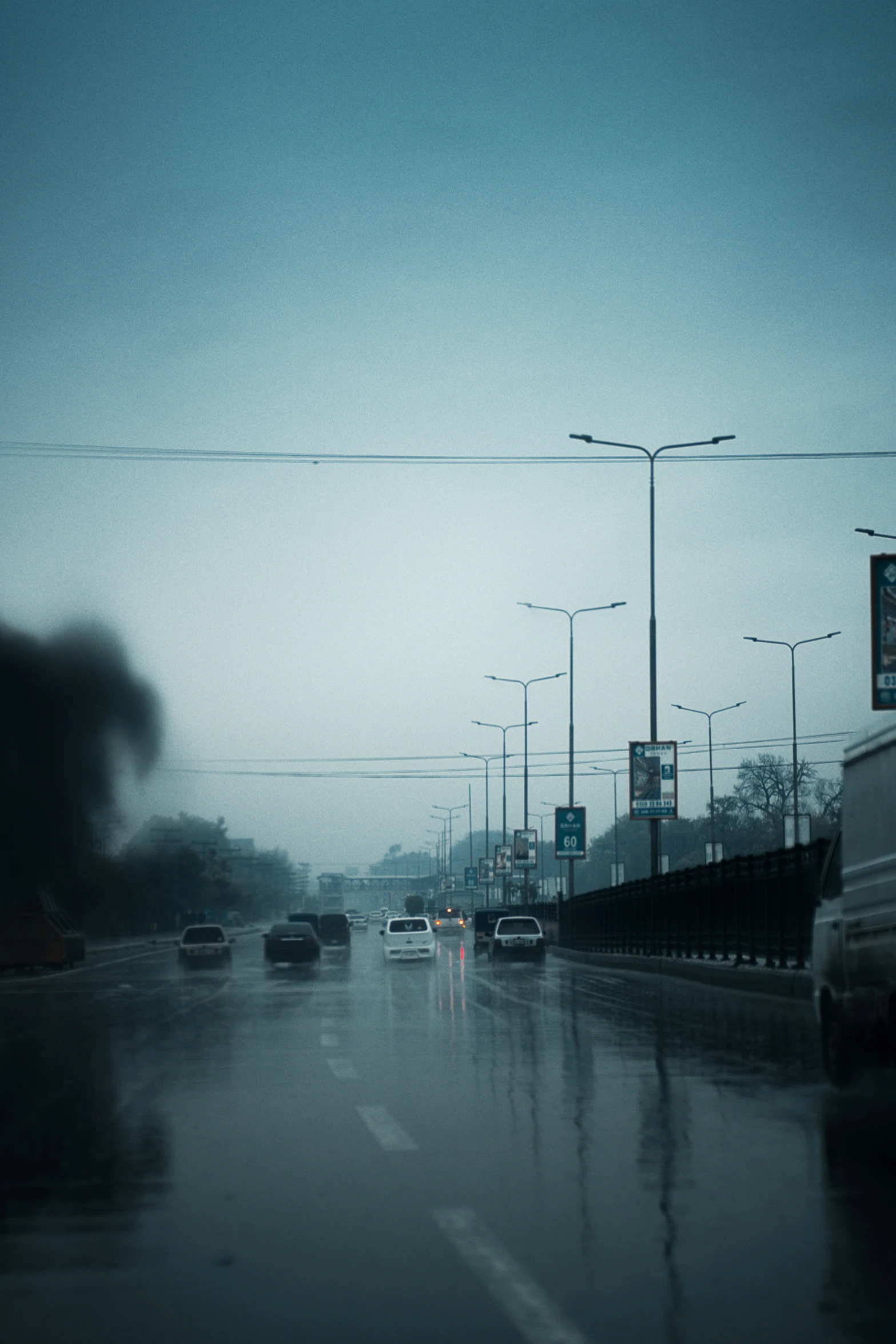 car traffic on a busy road on a rainy day