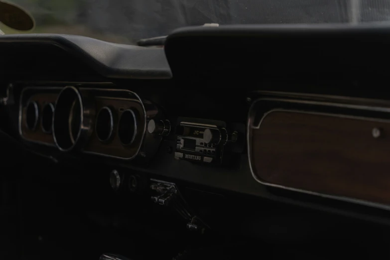 close up view of the dashboard of an old car