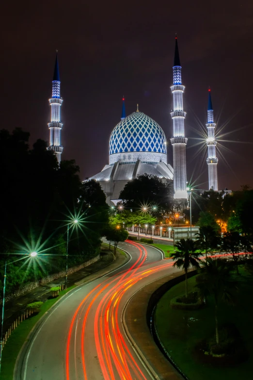 a night s shows the road and the dome of a building