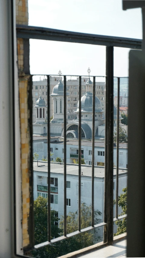 a po of the city from inside an open window