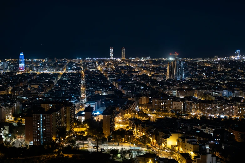 aerial view of a city skyline from above at night