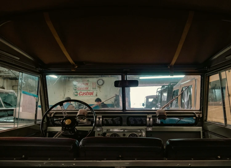 the view from inside of an airplane cabin, of another vehicle