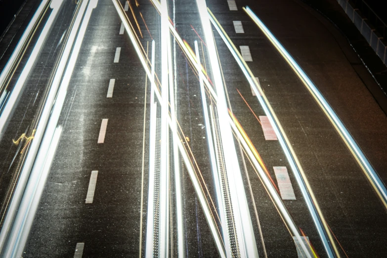 an overhead view of a road at night