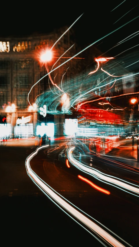 blurred pograph of a city street at night