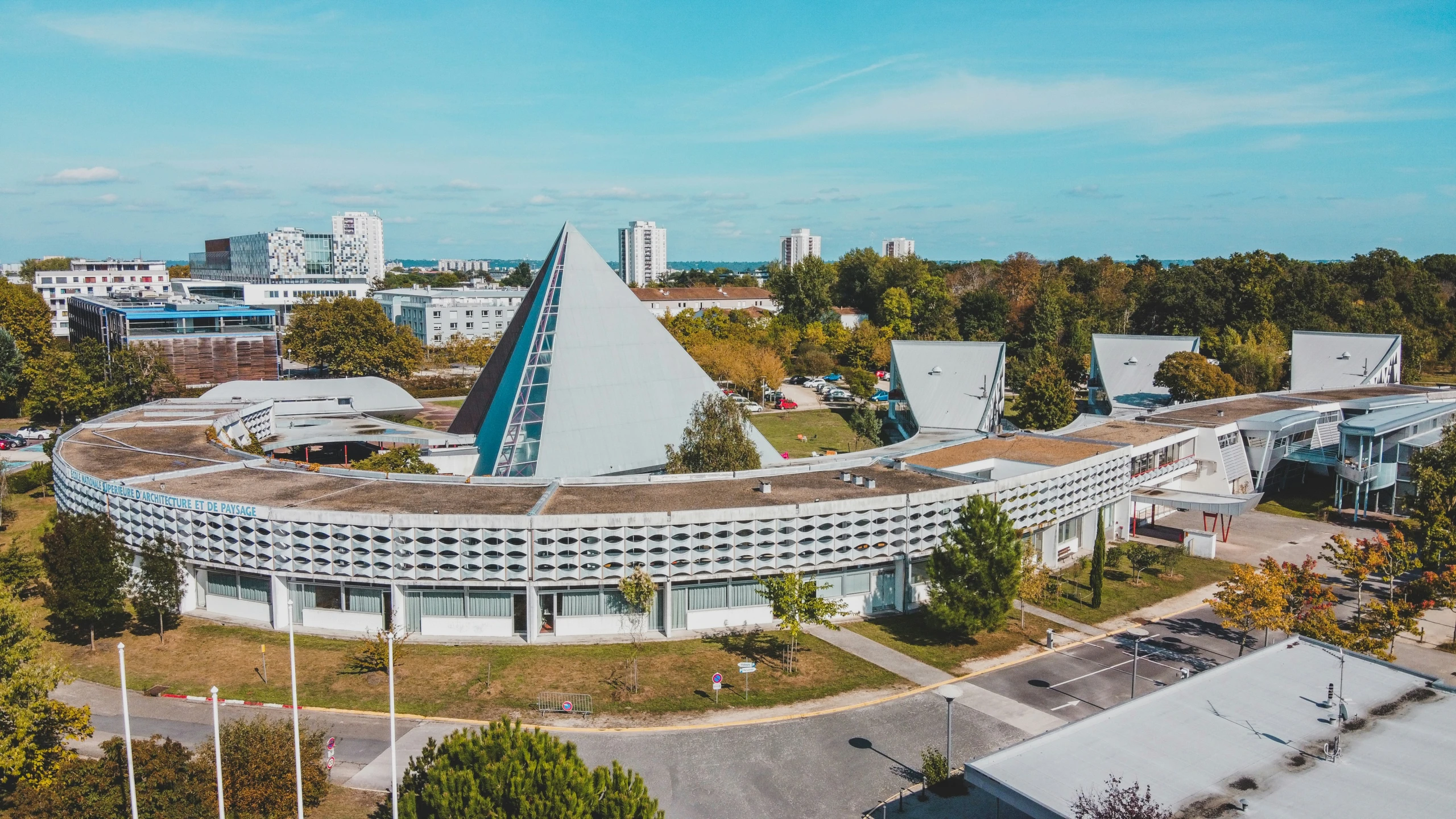 an aerial view of the center part of a complex and its surroundings