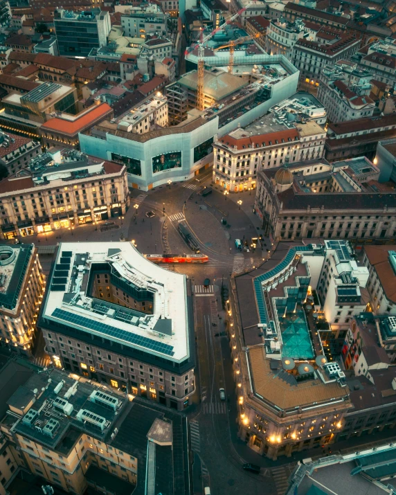 an aerial view of a town lit up at night