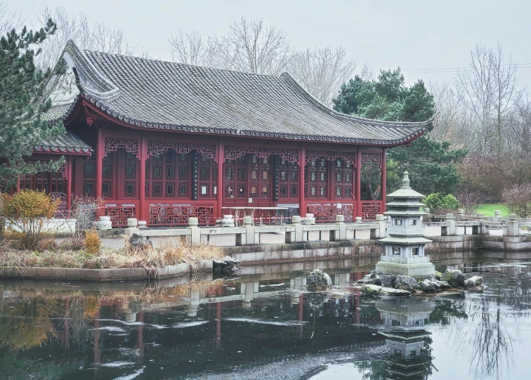 the oriental building is near the pond