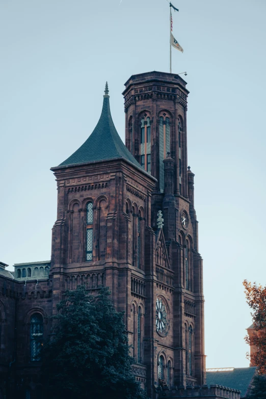 a church with a very tall tower and a clock