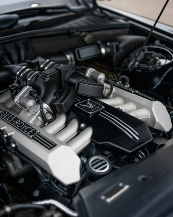 a bmw coupe engine sitting in a garage