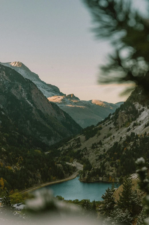 a scenic view of the mountains and lake