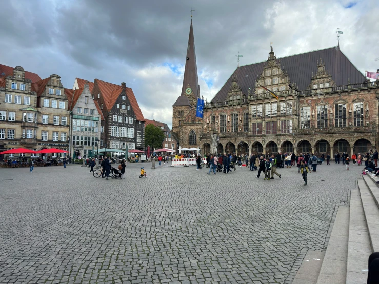 a city square with many people on the ground