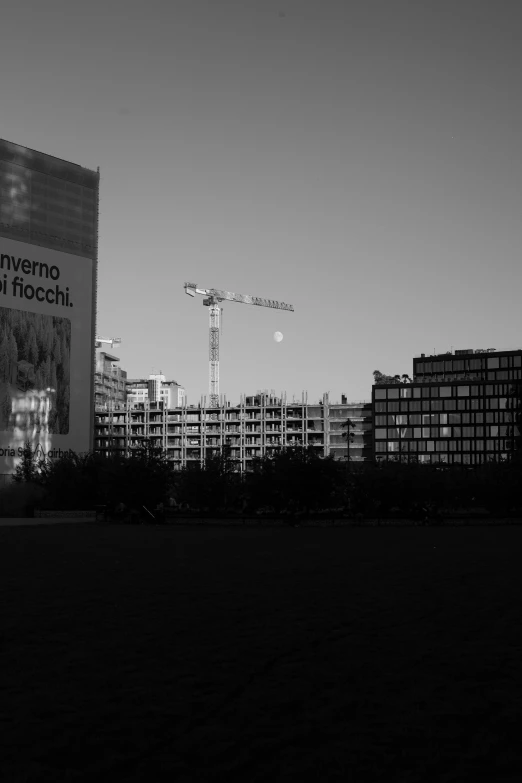 a large advertit sign in the middle of a city