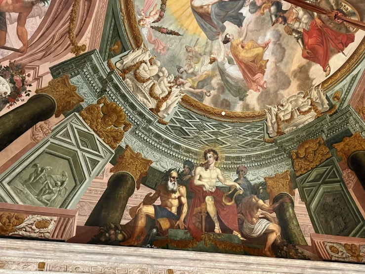 the ceiling in the dining room features a mosaic depicting a historical scene