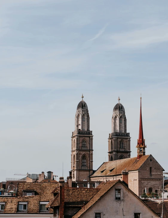 two very tall building with towers on top of it