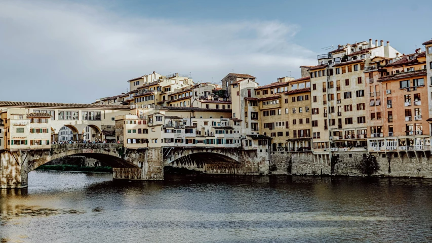 a po of a large stone bridge over a body of water