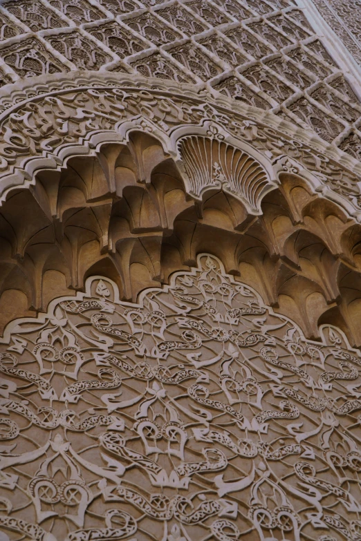 intricately carved stucco and arches of a building