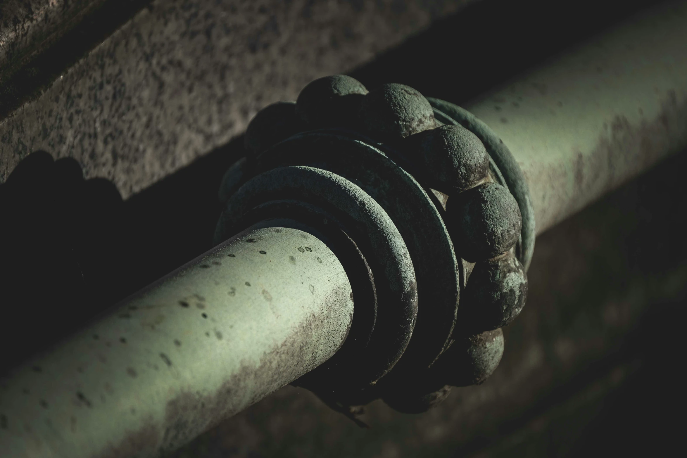 a metal railing on the bottom of a building