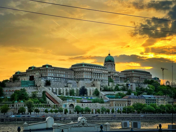 a very large building on top of a hill