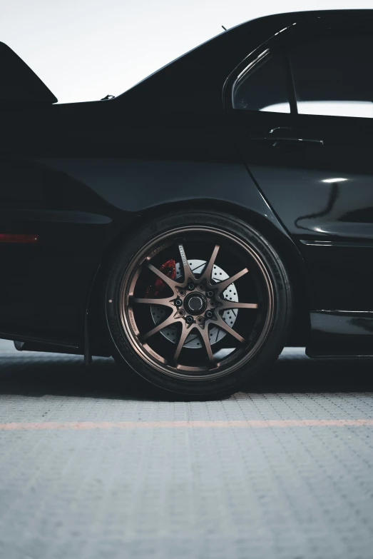 the wheel of a vehicle with a red stripe on it