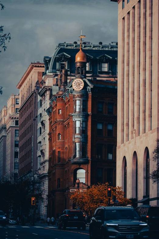 a city street and clock tower in a large city