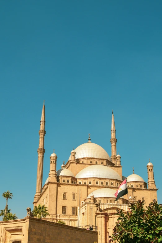 large building with several spires and tall buildings