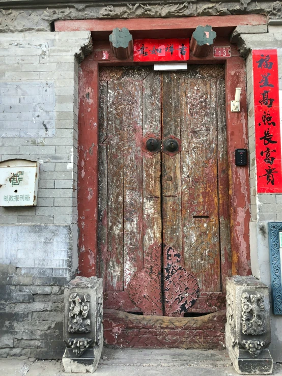 a brown door that is on a building